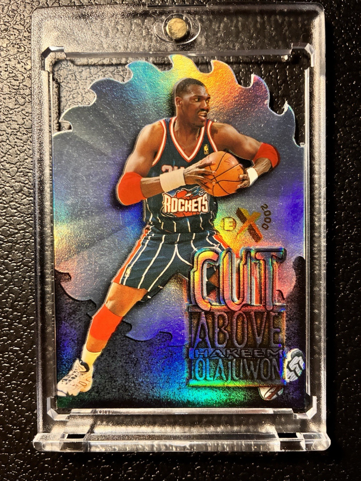 1996-97 Skybox E-X2000 - A Cut above Hakeem Olajuwon #7