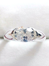 Sterling Silver Rhodium Plated 7x10mm Clear Oval Cut CZ Ring - Size 6