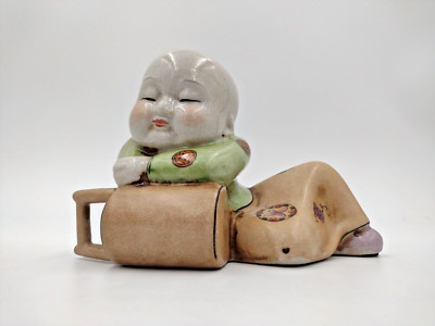 Vintage Chinese Crackle Glazed Porcelain Child Resting on Bucket Figurine