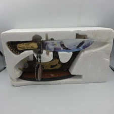 MAXAM 12-1/2" Fixed Blade Knife With Wolf Pack Deer Antler Display 