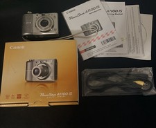 Canon PowerShot A1100 IS 12.1MP Digital Camera 4x Optical Zoom- New Battery