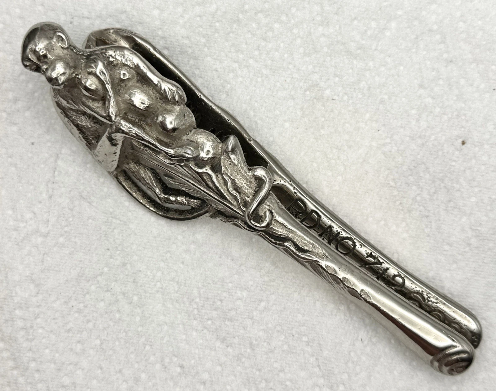 1926 Silver-Plated Cast-Iron Nutcracker - Monkey Collecting Coconuts Up a Tree
Opens in a new window