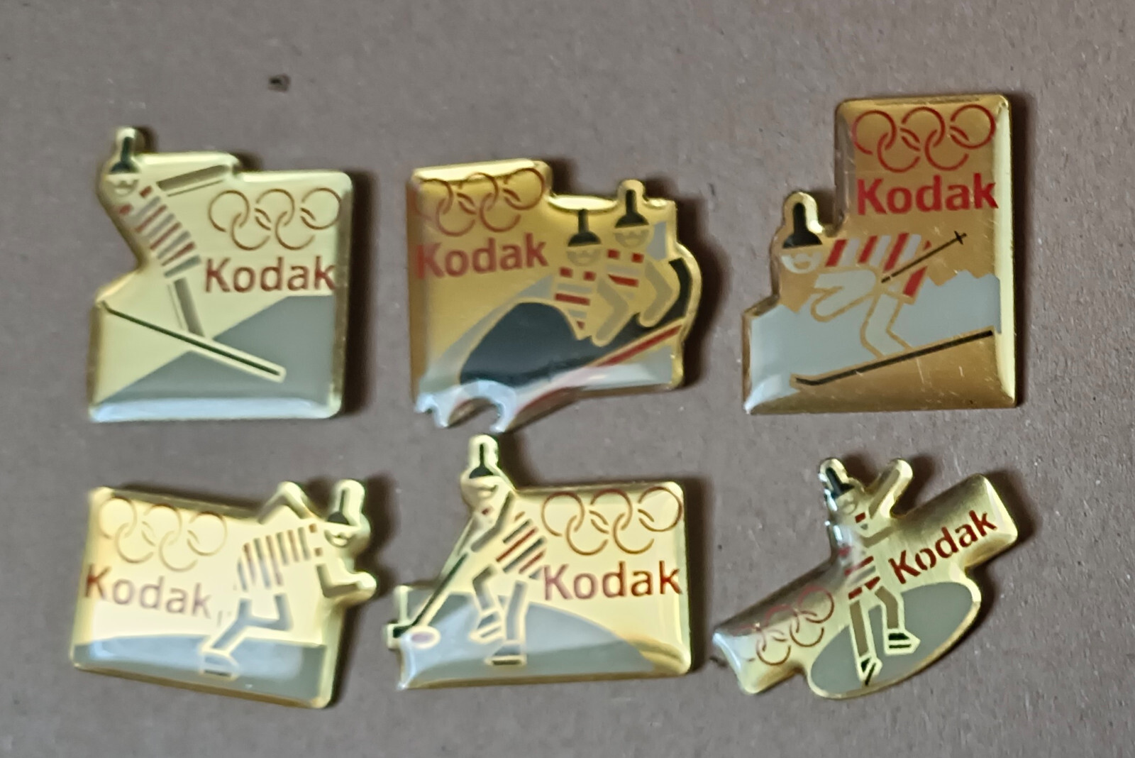 Lot De 6 Pins Kodak Jeux Olympiques époxy Fond Doré - Collection JO