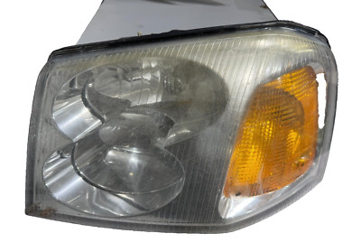 2002-2009 GMC ENVOY FRONT LEFT HEADLIGHT P/N 40310748 GENUINE OEM USED PART