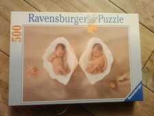 Puzzle Ravensburger 500 Pezzi tema neonati in conchiglia, nuovo.