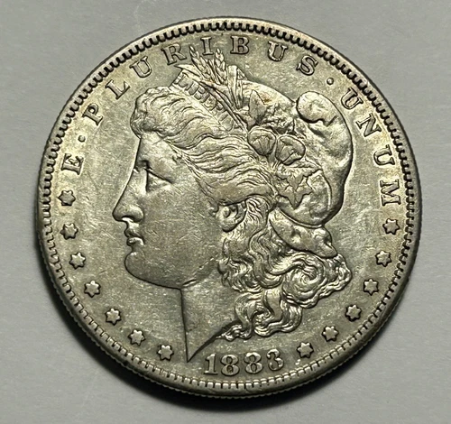 1883 S  MORGAN DOLLAR AU