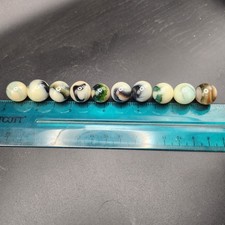 Lot Of 10 Panda Uranium Glass Vaseline Glass Marbles Uv Glow Multicolored