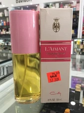 L'AIMANT COLOGNE SPRAY BY COTY 59 ML (classic )