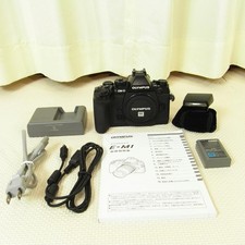 OLYMPUS OM-D E-M1 camera body, charger, flash cable