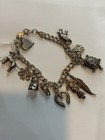 .925 Some Very Rare Charms 8” Vintage Sterling Silver Charm Bracele, 12 Charms