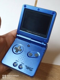 Nintendo iQue Game Boy Advance SP Ags 101.  shell - Pokemon Sapphire Kyogre