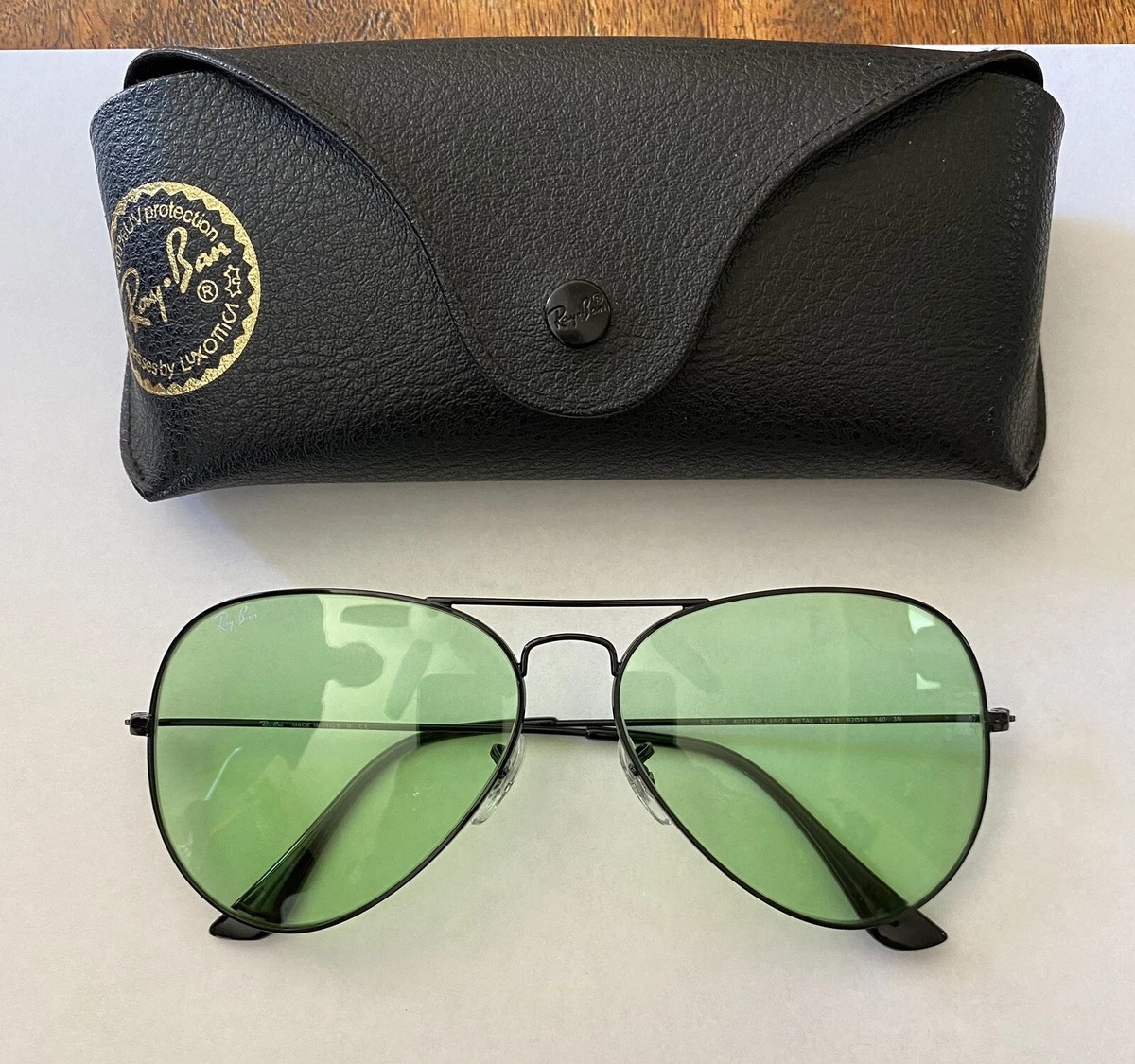 Black framed aviator sunglasses top