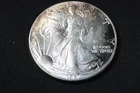 NobleSpirit GEM BU 1987 American Silver Eagle .999 1oz Light Toning on Edges