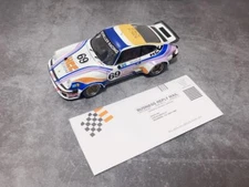 EXOTO Porsche 934 RSR - 1976 LeMans 24 Hours - Vetsch & Haldi - HCC Skiwear #69