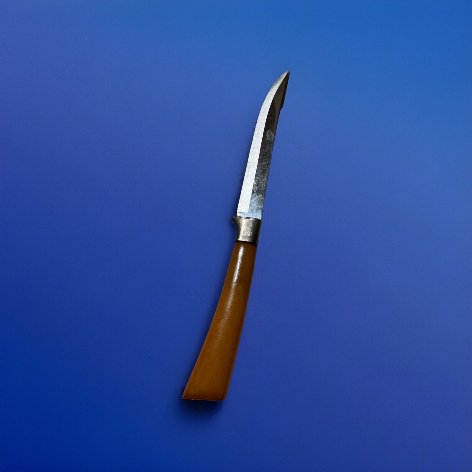 Steak Knife With Orange Handle
