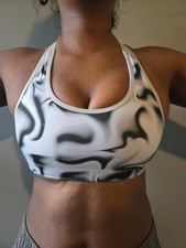Grey, Black, And White Designed Sports Bra With Good Coverage