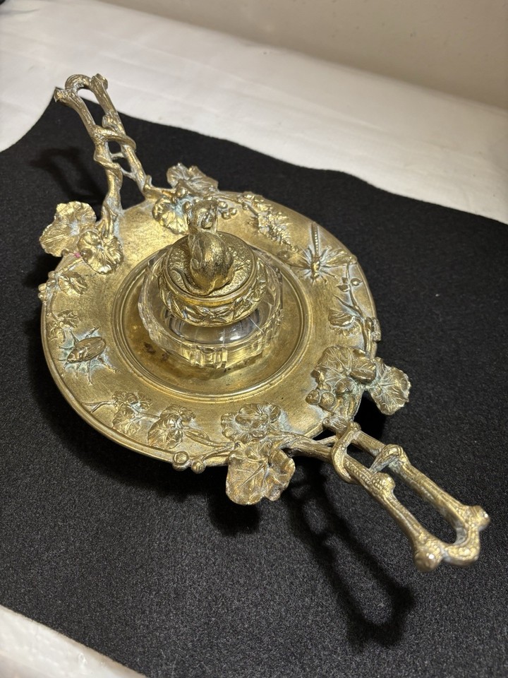 An 1880s Art Nouveau brass mouse inkwell — a 12" sculptural mouse figure holding an inkstand, genuinely one-of-a-kind antique desk art.