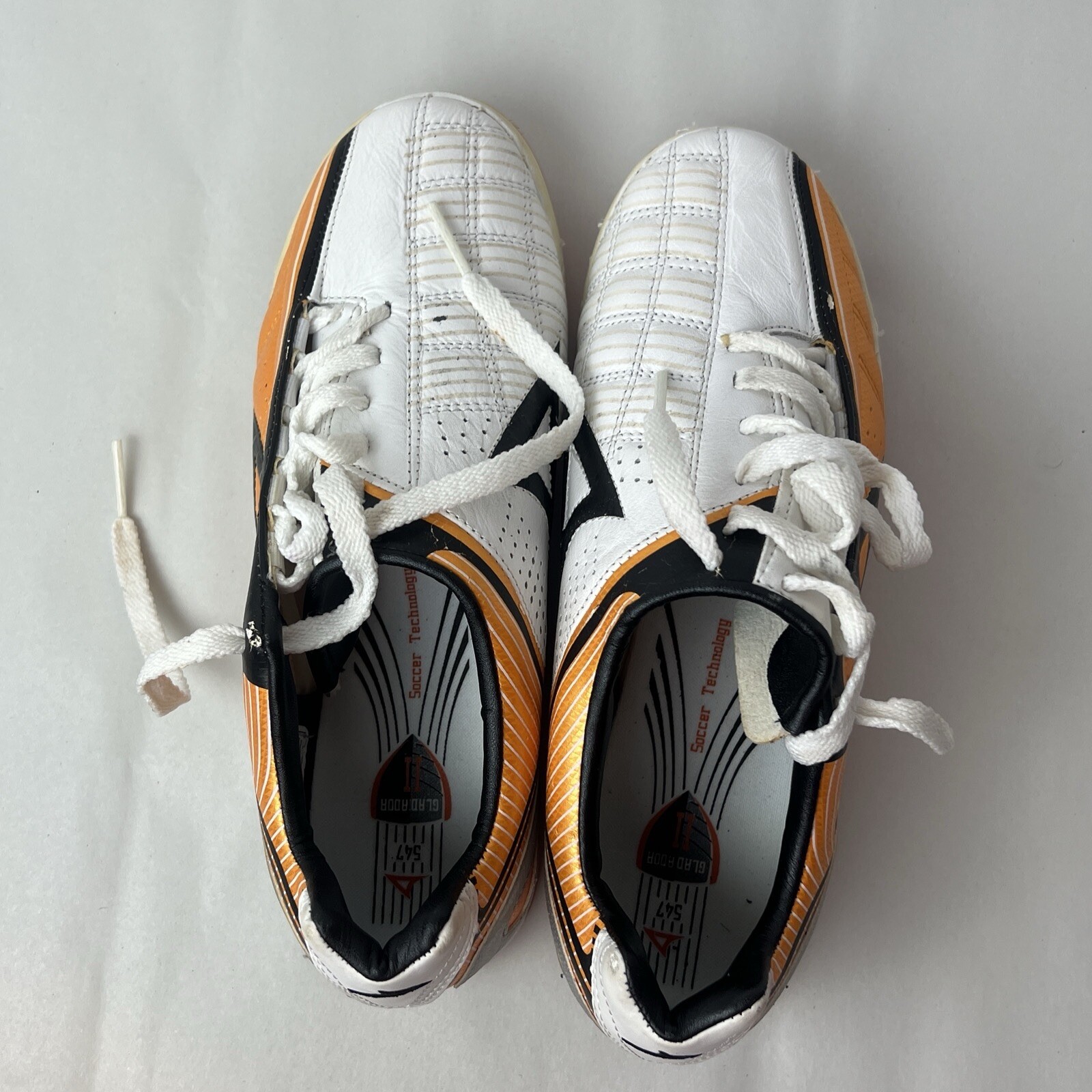 Pirma cleats/shoes 7.5 men From Mexico Gladiator II . Orange/white