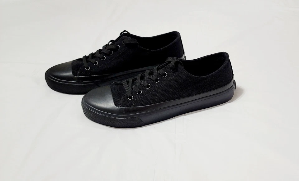 Zapatillas deportivas para hombre Calvin Klein talla 7,5 M negras de lona parte superior baja con cordones punta redonda Foto 2 de 4