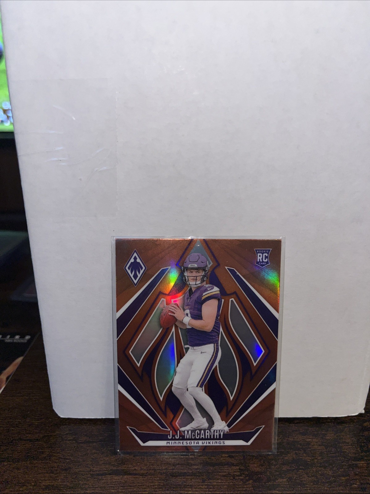 2024 Panini Phoenix - Rookies J.J. McCarthy #185 Orange (RC)