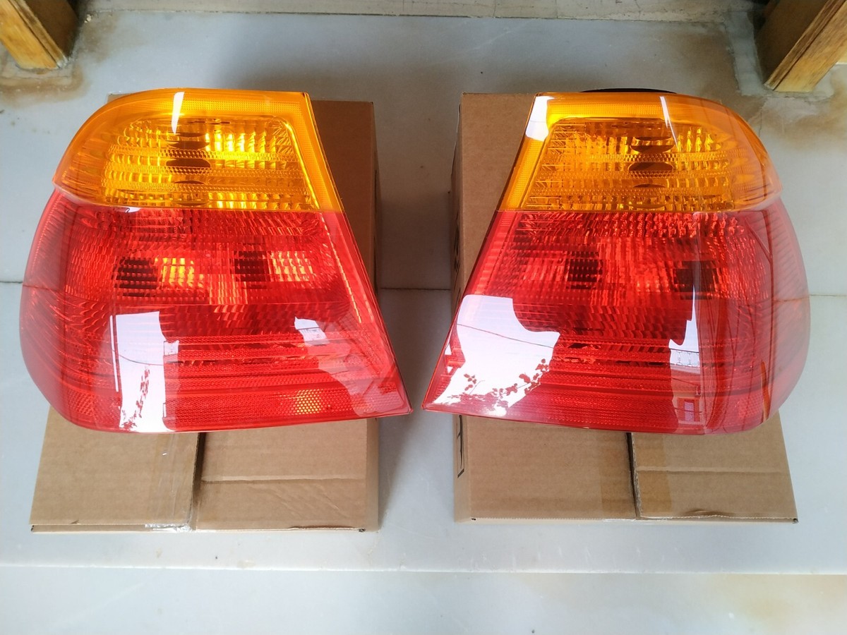 BMW E46 tail lights L+R side panels SEDAN ULO NEW OEM 63218364921