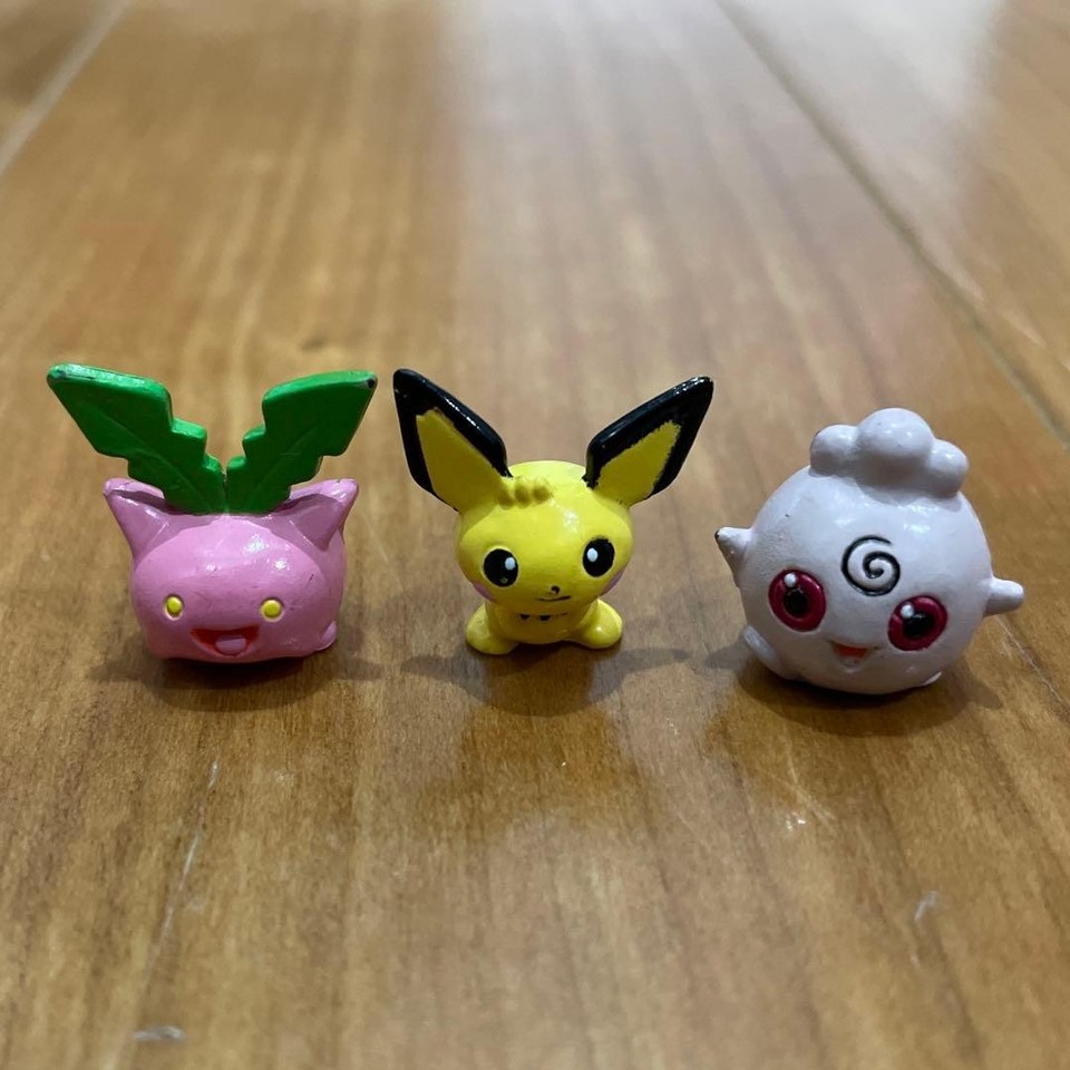 Tiny Pikachu chibi house figure with retro Pokémon aesthetics — a perfectly pocket-sized collectible that looks great on a desk or shelf.