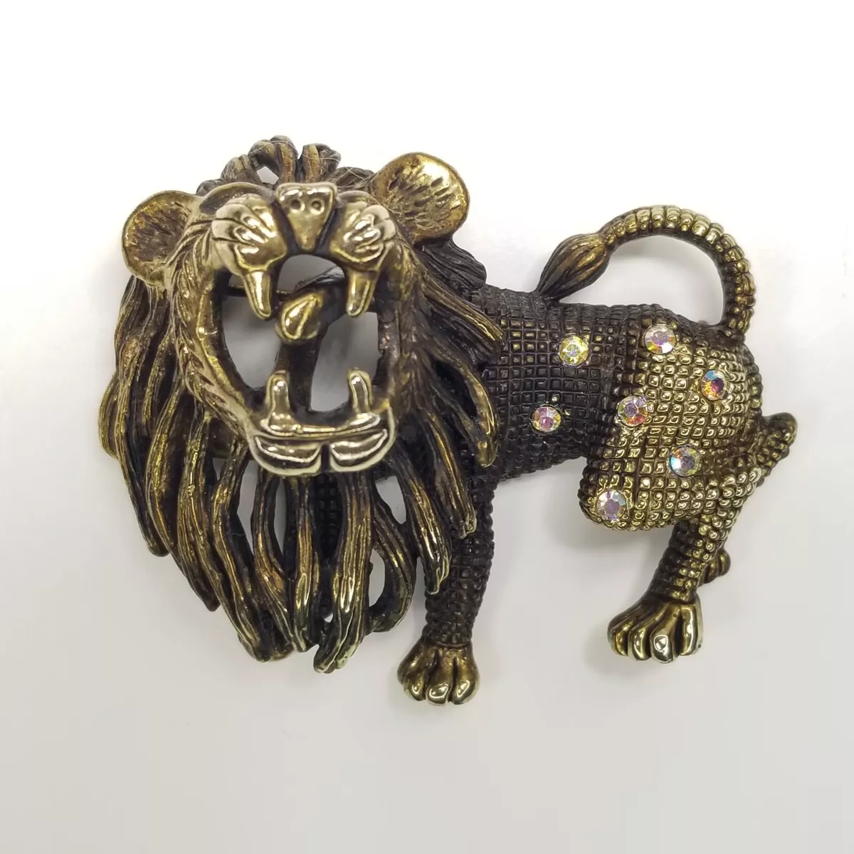 Lion brooch on sale