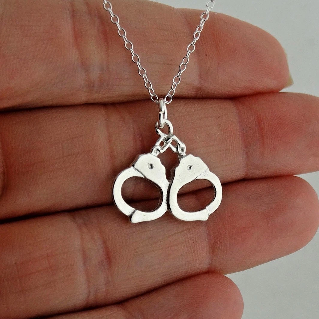 Partners in crime necklace handcuffs sale