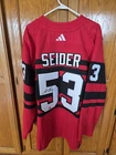Fanatics Under Wraps Signed Moritz Seider NHL Red Wings Reverse Retro Jersey