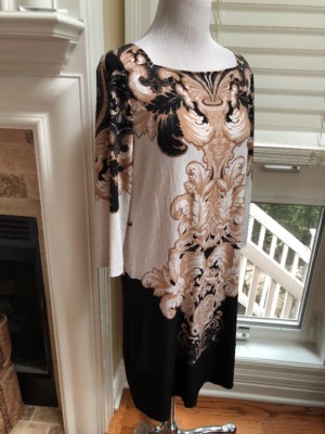 grecian designer dresses Off-white and black crepe evening dress with a Grecian neckline finely made up out of black pearls. The Grecian or Greek neckline is characterized by a piece of fabric which, starting at