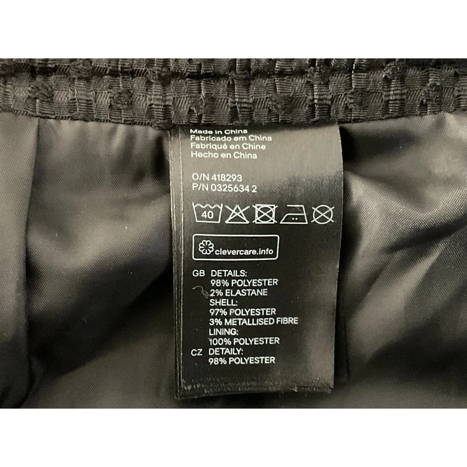 Falda para mujer H&M 10 negra blanca tweed cintura elástica cremallera trasera Foto 4 de 4