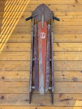 VINTAGE RED ROCKET STYLE SELF-GUIDING SNOW SLED.