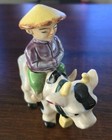 Chinese Man Riding Cow Figurene