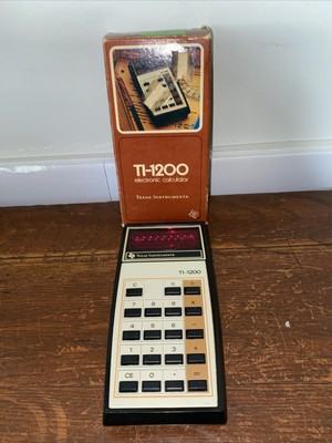 Vtg TEXAS INSTRUMENTS TI-1200 Elect. Calculator with Original Box Works. 1976