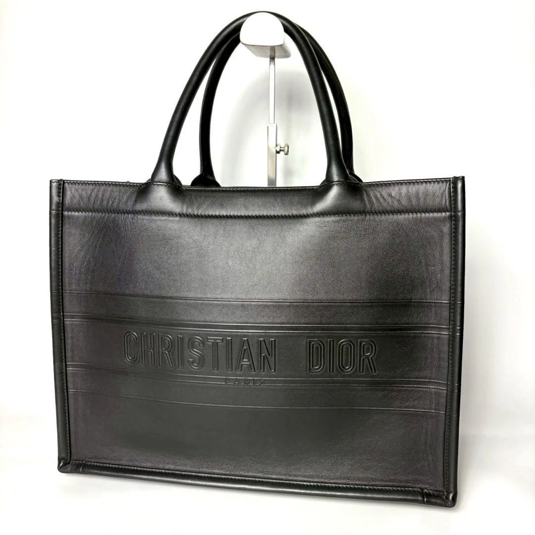 Sac fourre tout Christian Dior en cuir noir moyen livre avec puce ic