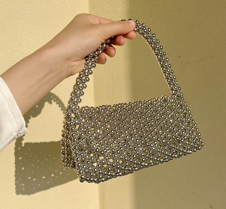 Bolso de mano para axilas de un solo hombro tejido hueco abatible de moda para mujeres Nuevo Foto 3 de 4