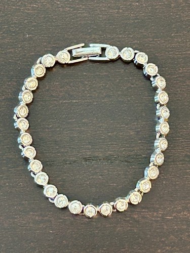 Swarovski Crystal and Silver Tone Tennis Bracelet - Swan Signed