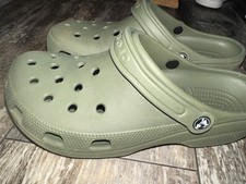 Dark Moss Green Crocs. Size M9 W11. Lightly Worn. Cleaned. No Box.
