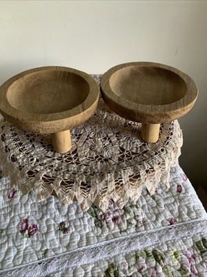 Two Round Wooden Risers