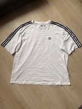 Woman’sadidas Originals three-stripe oversized t-shirt in white Size Medium