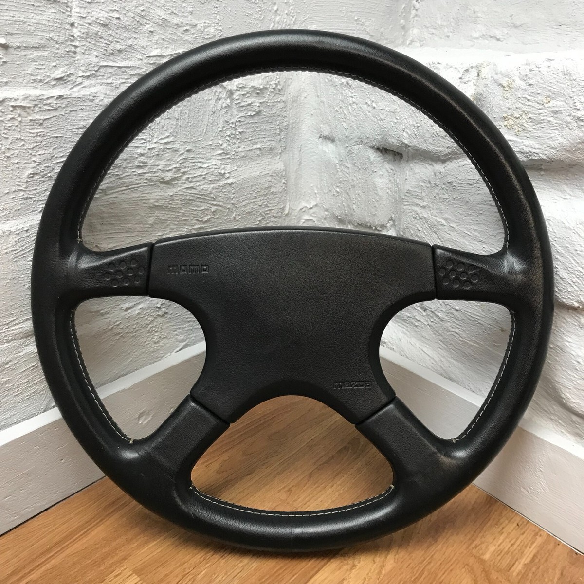 Genuine Momo Ghibli 380mm, M38 black leather steering wheel. Mazda