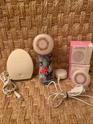 Clarisonic Skin Brush + Foreo Sonic Skin Cleaner + 4 New Brush heads.