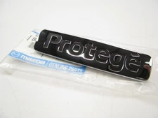NEW GENUINE Trunk Lid Nameplate Badge Emblem OEM 1995-1998 Protege BD0G-51-721