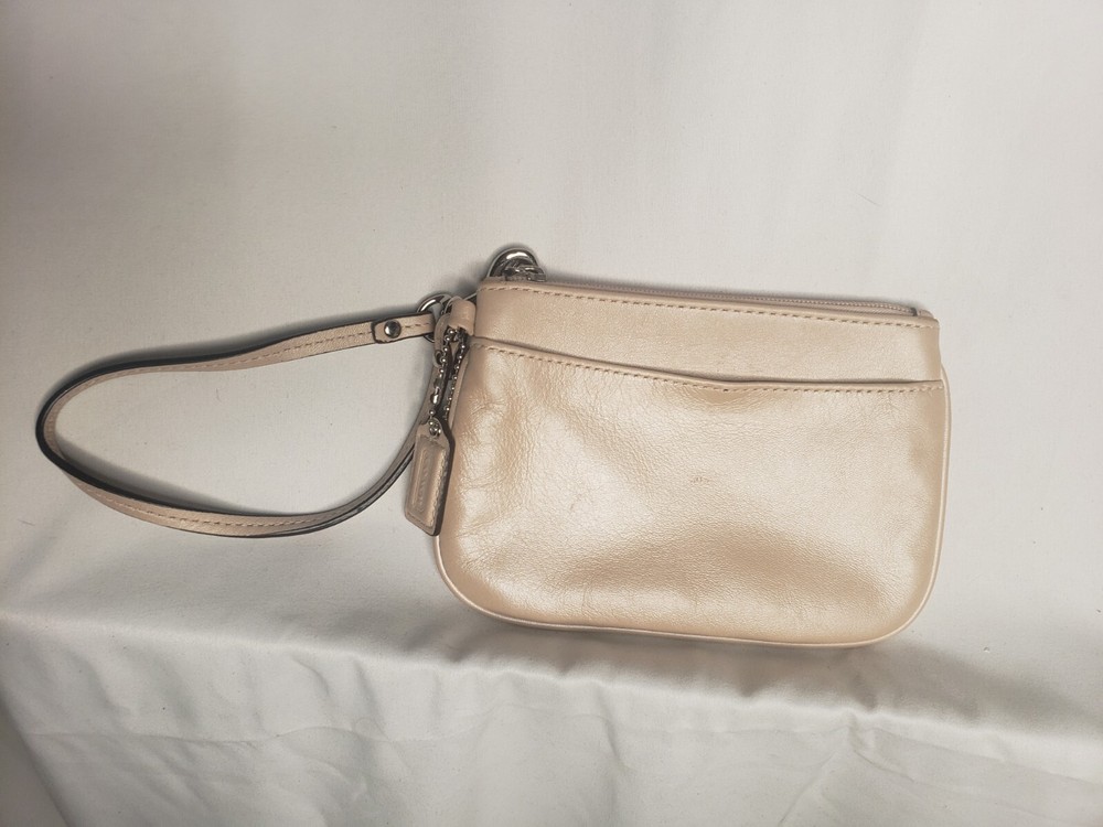 coach leather wristlet cream color