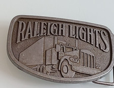 VINTAGE RALEIGH LIGHTS BELT BUCKLE FOR MEN SEMI TRUCK MARKED ON BACK