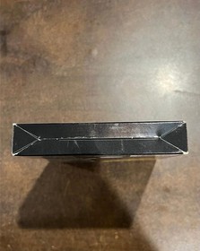 Danny Sullivan&rsquo;s Indy Heat Nintendo NES completo CIB - come nuovo!