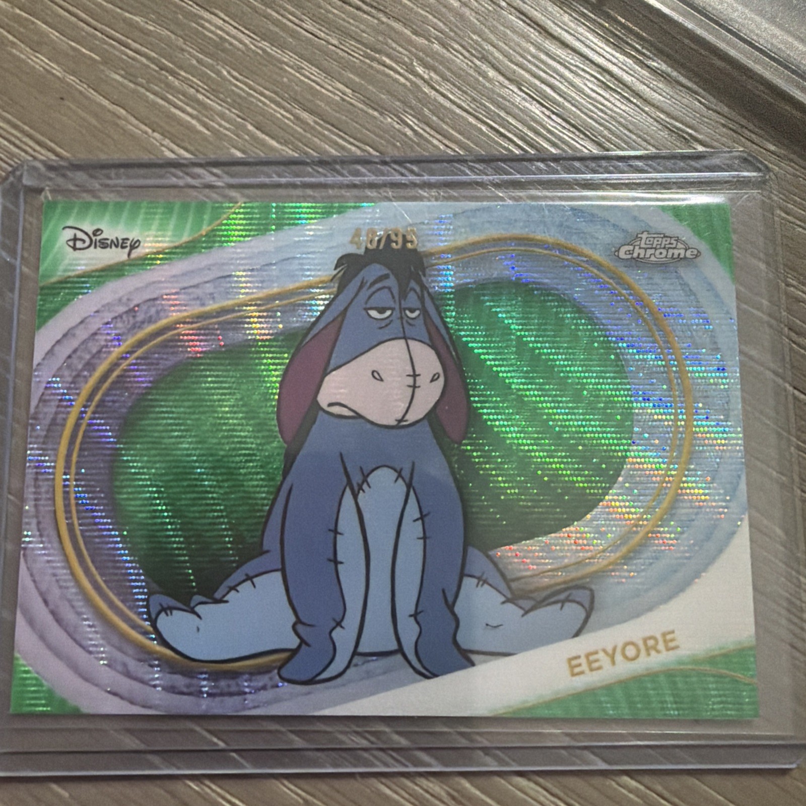 2025 Topps Chrome Disney Eeyore /99 Green Wave Refractor #143