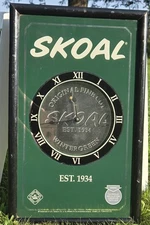 Skoal 21.5"x13" Hanging Clock. Works.