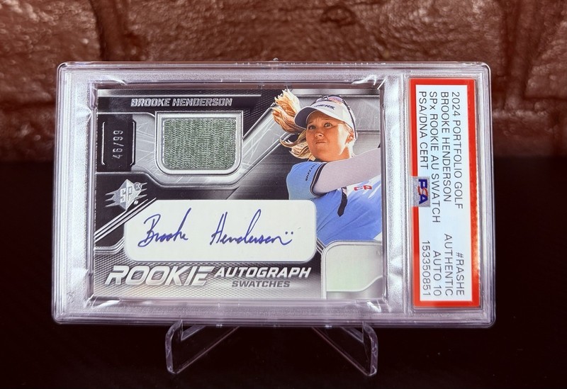 2024 Upper Deck Portfolio Brooke Henderson SPx Rookie Auto Swatch /99 PSA/DNA 10