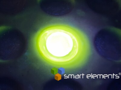 Dysprosium 3+  doped GdNaP glass bead - intense yellow luminescense